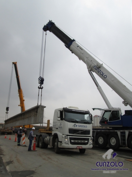 A Cunzolo realizou o içamento de 02 vigas de 30 metros de comprimento, 1,20 metros de largura e peso de 30 toneladas cada. Para essa operação foram utilizados 01 Guindaste Rodoviário Tadano ATF 220 (cap. 220 t.), 01 Guindaste Rodoviário Liebherr 220 (cap. 220 t.) e 02 carretas Dolly.